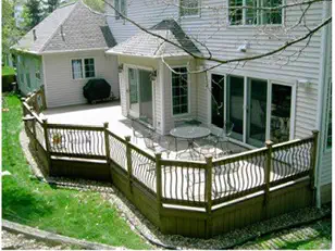 Entry deck and stairs at the side door of a house