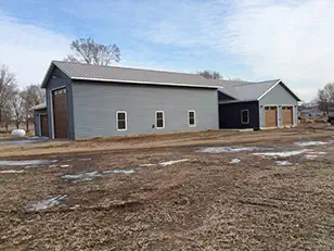 Side view of a new home and attached shop