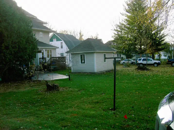 Backyard with the old garage area before the project